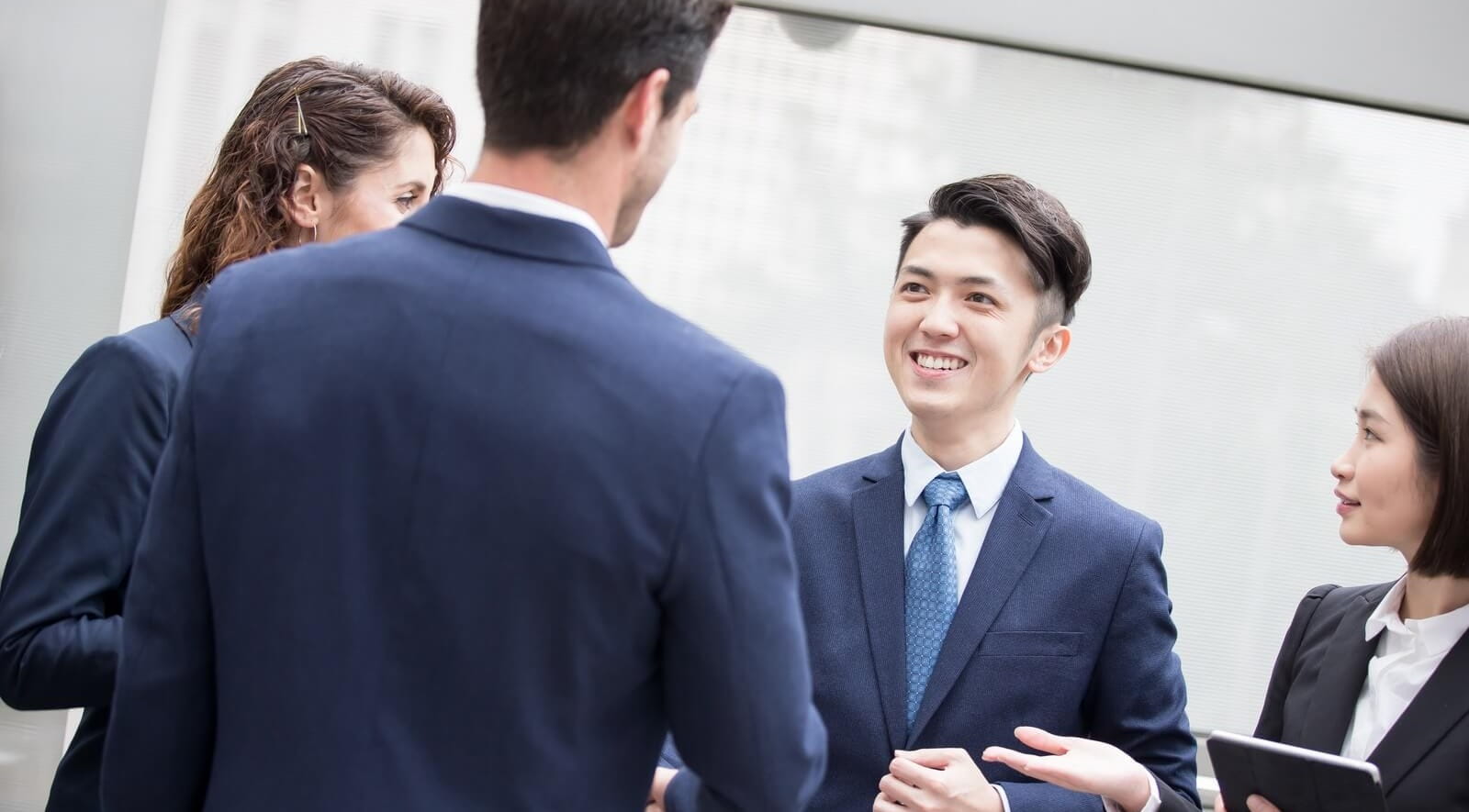 Young men shaking hands
